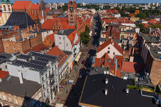 view of the old town of Torun and the Vistula river from above during a warm summer day.