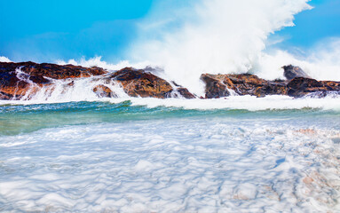 Rocky coastline on Diaz Point with strong sea wave - Luederitz, Namibia