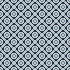 Seamless vector pattern with tile black polka dots on pastel blue background