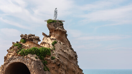 Built by Napoleon's order, a local landmark of Biarritz city Rocher De La Vierge in shape of tongue...