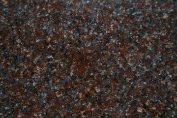 The marble surface shows the smooth and beautiful texture of marble. brown background.