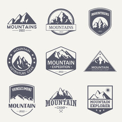 Vector Labels with Hand Drawn Mountains Isolated. 2022. Illustration for Ski Resort, Hiking, Climbing, Mountain Biking Logo Set. Drawing Winter Landscape, Camping Design