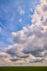 Beautiful landscape with clouds on a spring day, abstract background.