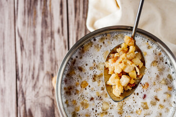 fried lard cracklings on a wooden rustic background