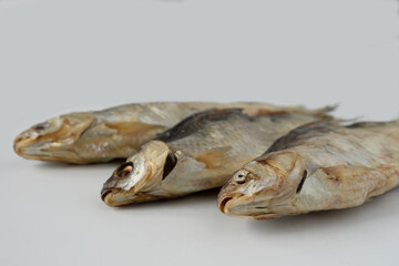 dried dried river fish on a white background