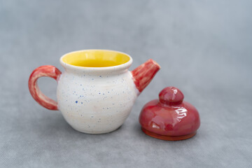 Ceramics, a ceramic product made with their own hands, made on a potter's wheel, jug, mug, clay, glaze.