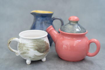 Ceramics, a ceramic product made with their own hands, made on a potter's wheel, jug, mug, clay, glaze.
