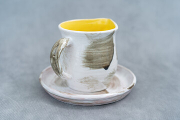 Ceramics, a ceramic product made with their own hands, made on a potter's wheel, jug, mug, clay, glaze.