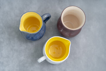 Ceramics, a ceramic product made with their own hands, made on a potter's wheel, jug, mug, clay, glaze.