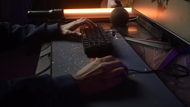 gamer playing computer games. keyboard and mouse close up.