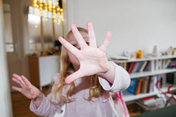 Child showing hand palm
