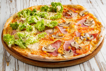 delicious hot traditional italian pizza on a white wooden rustic background