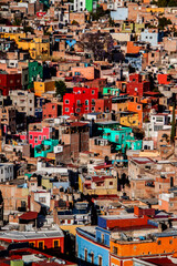 Exterior view of colorful historical old town buildings in the downtown of Guanajuato state, Mexico. Vivid, multicolored colonial neighborhood with traditional Mexican architecture. 