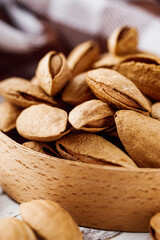 fresh almonds in shell on a white background