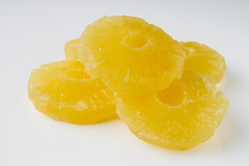 delicious dried pineapple on a white acrylic background
