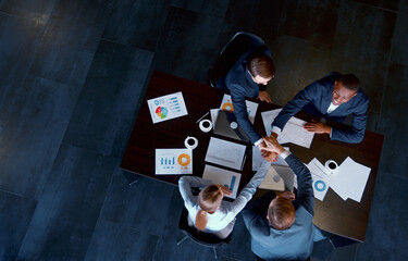 Business team performing an action at the table