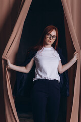 Obraz premium Young beauty business woman in elegant suit indoors. Smart, intelligent woman