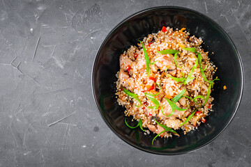 traditional chinese fried rice on black background