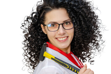 Young brunette woman in white robe holding hammer. Repair concept