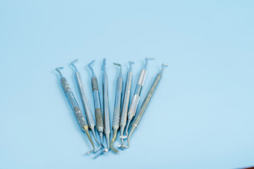 Dentist tool set. Teethcare, dental health concept. Blue background top view copy space