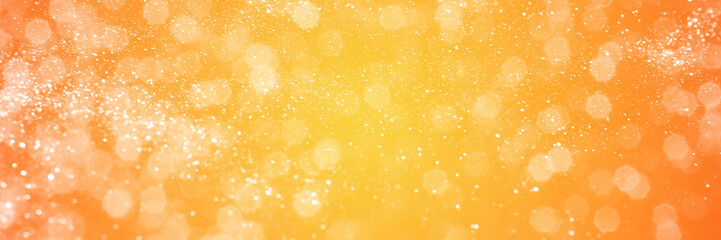 Summer orange sparkling glitter bokeh background, banner texture. Abstract defocused lights header. Wide screen wallpaper. Panoramic web banner with copy space for design
