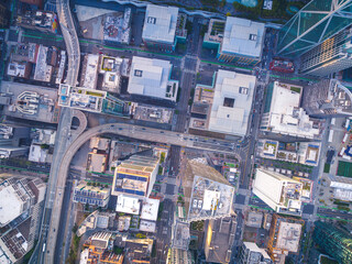 Aerial top-down cityscape view over downtown San Francisco with freeway roads