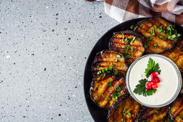 grilled eggplant on Georgian on a gray stone background