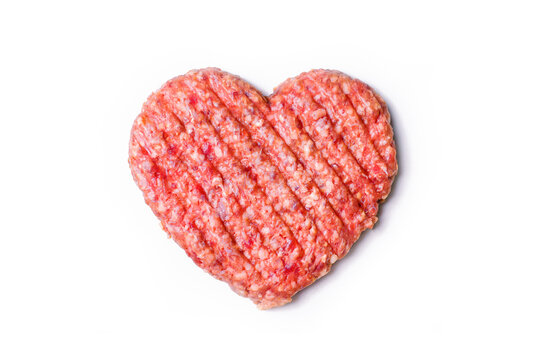 Meat love. Dinner for lovers on February 14th. Mince heart. Valentine's Day. Meat cutlet in the shape of a heart