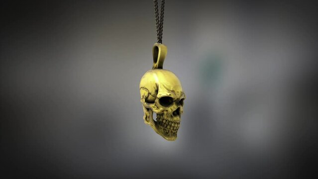 High quality close up render of a small shiny gold skull pendant, swinging slowly on the end of a neck chain, with super shallow depth of field abd bokeh background
