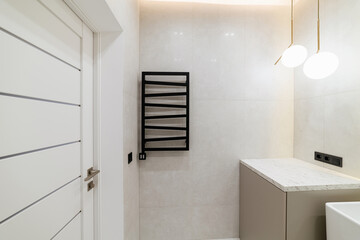 bright bathroom interior design with white doors
