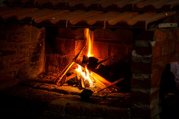 fire in brick and tile barbecue