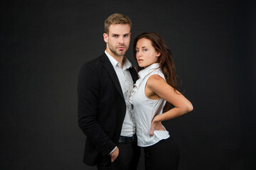formal couple in love. businessman and businesswoman. partnership of businesspeople.