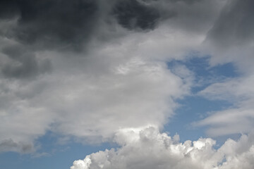 Obraz premium Background of light blue sky with white clouds at the bottom