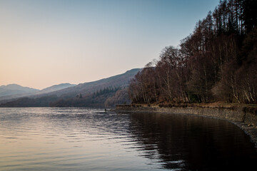 A landscape photograph looking across the waters of Loch Lomond in Scotland.