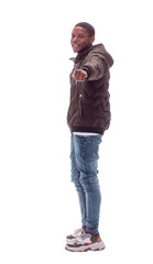 Fototapeta premium side view. casual guy in jeans looking at copy space