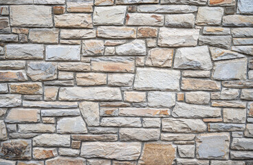 light-colored natural stone wall