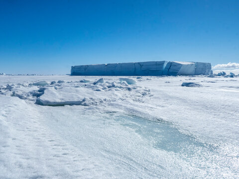 Tabular ice trapped amongst the first year sea ice near Snow Hill Island, Weddell Sea