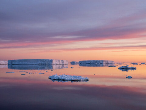 Sunset over tabular and glacial ice near Snow Hill Island, Weddell Sea