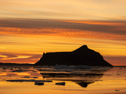 Sunset over tabular and glacial ice near Snow Hill Island, Weddell Sea