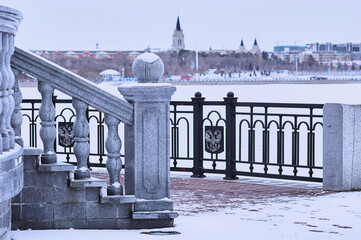 Fragment of the balustrade of the rotunda on the embankment of the river in winter. Winter...