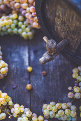 Wine barrel with Riesling grapes in harvest season, Hungary