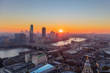Aerial view of London skyline and River Thames at sunset taken from St. Paul's Cathedral, London