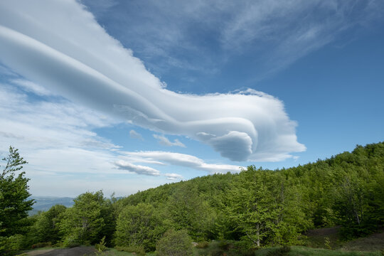 Long lenticular clouds in a mountain landscape, Emilia Romagna