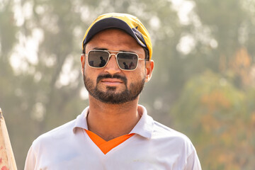  young cricketer face closeup view on match ground