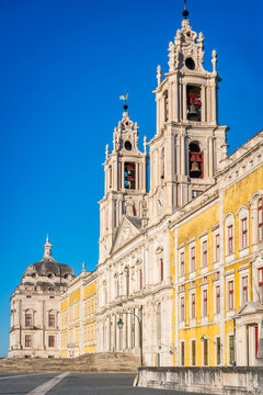 Mafra Palace entrance with iconic towers and bells, Mafra, Portugal