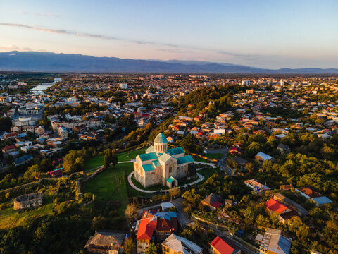 Aerial cityscape view of Bagrati Cathedral and Kutaisi, Imereti, Georgia (Sakartvelo)