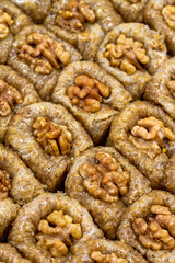 Walnut baklava. Close-up of baklava in a tray. local name cevizli bulbul yuvası baklava