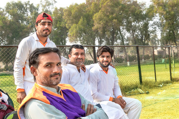 cricket players looking into the camera on match ground