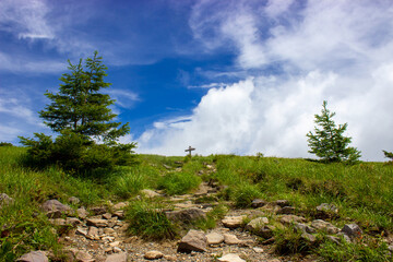 Winding roads on the plateau with clouds in the background