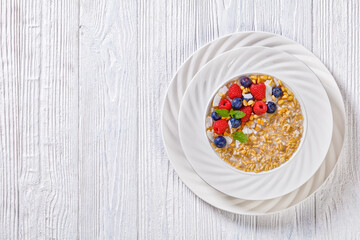 hulled whole grain oat porridge with berries